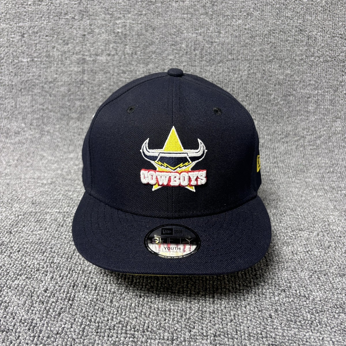 New Era 9FIFTY North Queensland Cowboys NRL Youth Snapback Hat Navy Yellow