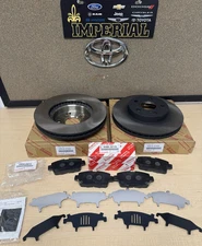 2004-2009 TOYOTA PRIUS GENUINE NEW FRONT BRAKE KIT OEM ROTORS TCMC PADS & SHIMS