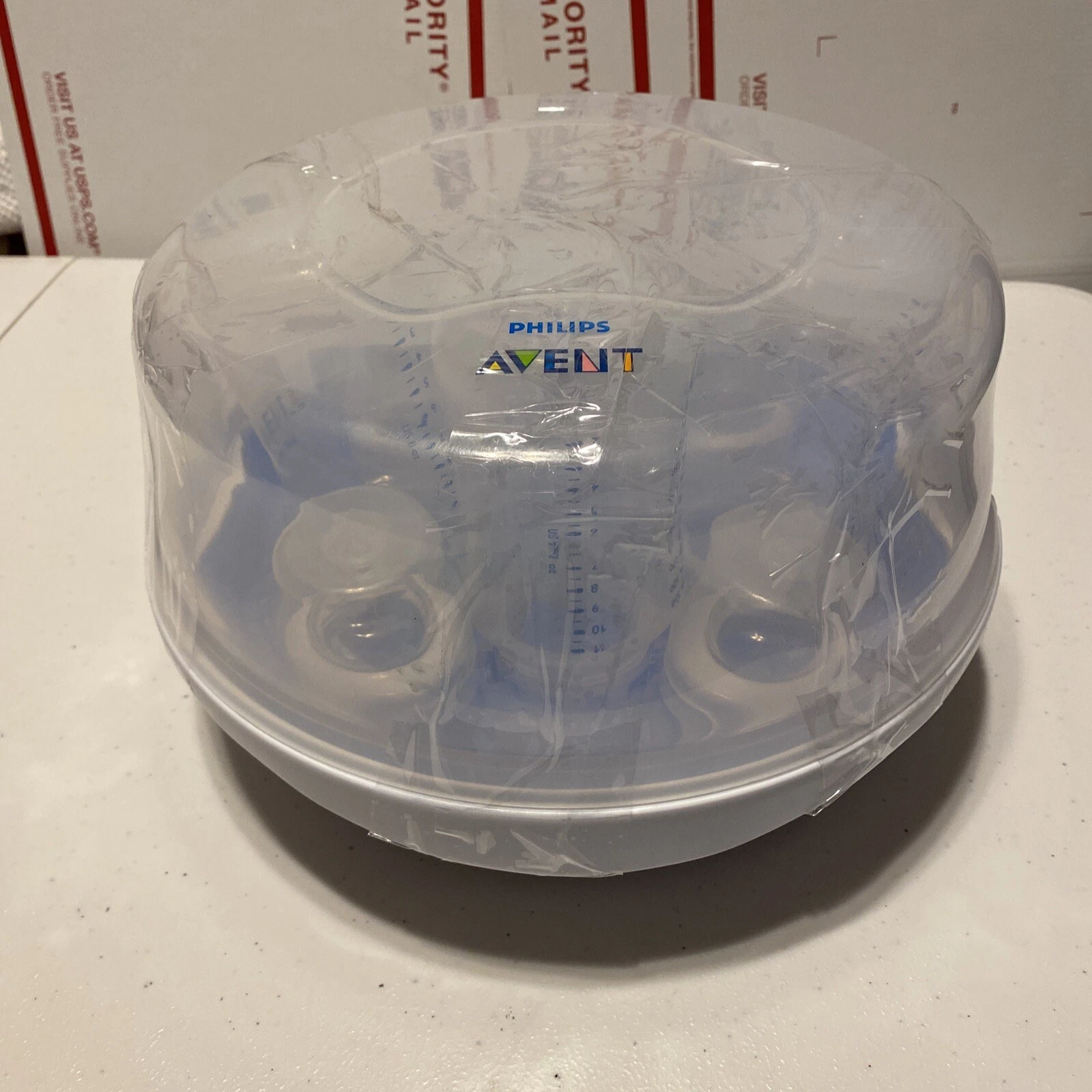 Philips Avent Natural Baby Bottles, Clear, 11 Oz, 4 pack with Microwave Steriliz