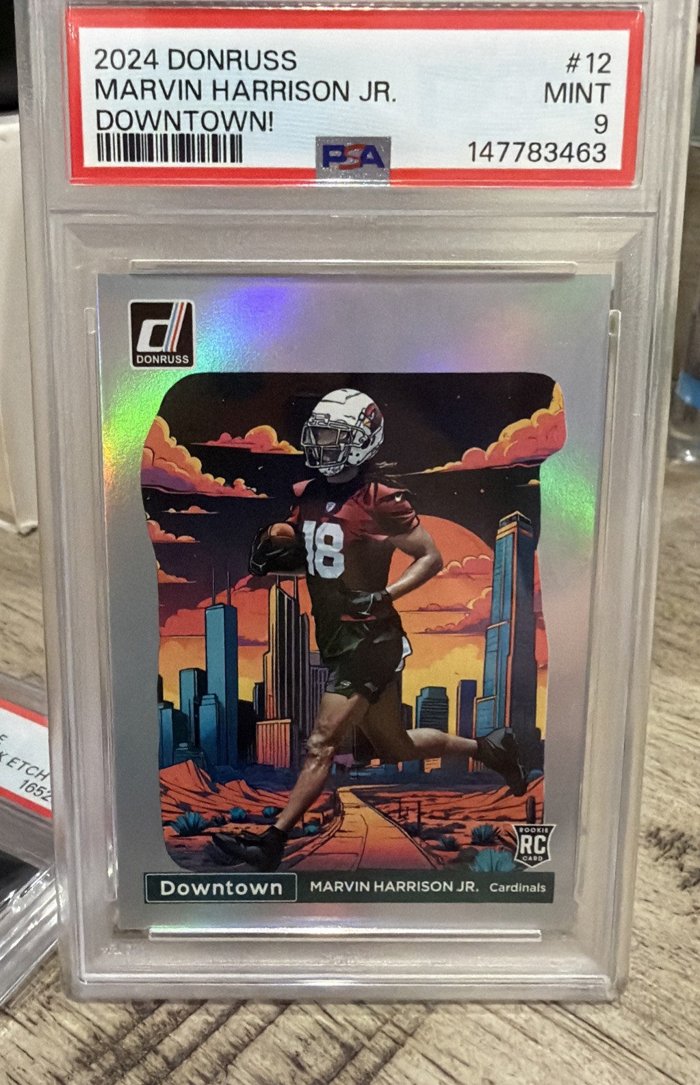 Panini Donruss 2024 Marvin Harrison Jr. Cardinals RC Downtown! #12 PSA 9 view 2