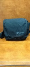 Polaroid Spirit 600 Land Camera with carrying bag.