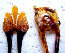 Two faux shell vintage hair combs with parti coloured design