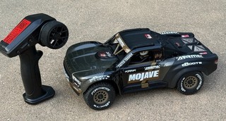 Arrma Mojave GROM 4X4 223S BLX camion deserto brushless RTR DSC nero con 3S Lipo