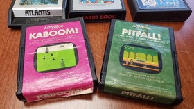 Atari 2600 Game Lot 24 Carts Pitfall Kaboom Atlantis Mario Bros Pac‑Man