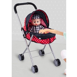 black baby doll with stroller