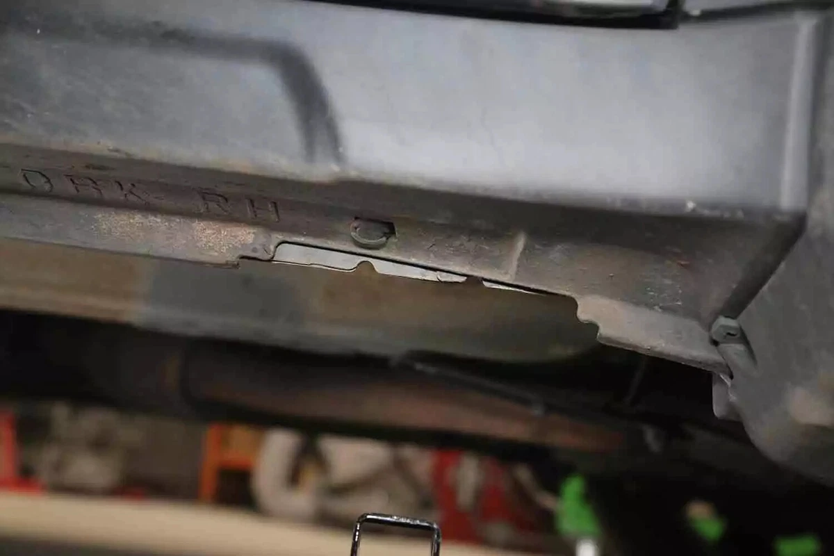 The two notches in a vehicle's jack point.