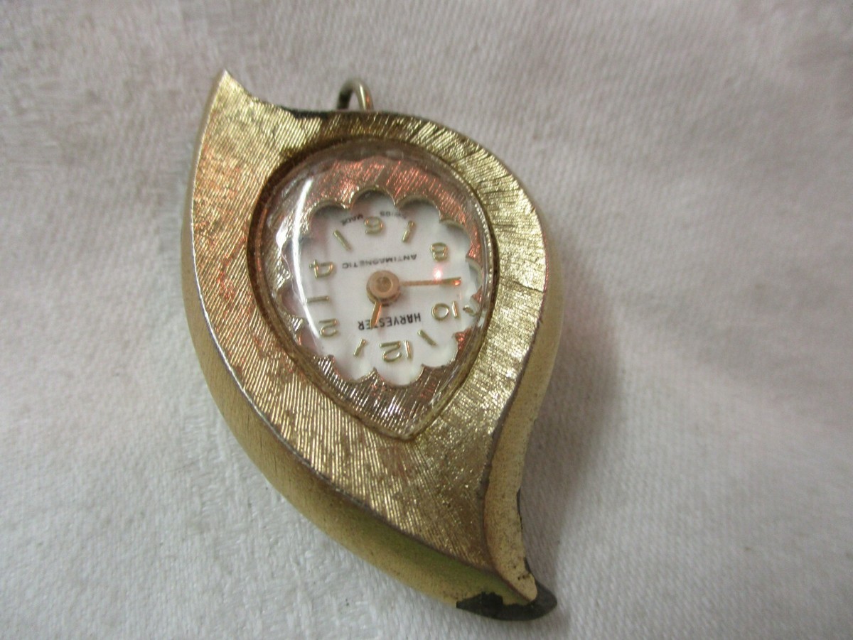 Vintage Swiss Harvester gold tone Pendant Watch Anti Magnetic Runs
