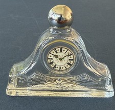 Vintage Avon empty 'Odyssey' eau de toilette bottle clock shape