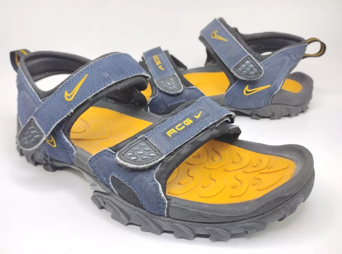 Yellow nike sandals sales