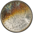 1884-O PCGS MS64 Morgan Dollar w/ Explosive Rainbow Toning & Monster Eye Appeal