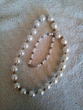 Faux Pearl Necklace White with Gold tone beads and clasp about 23 inches long