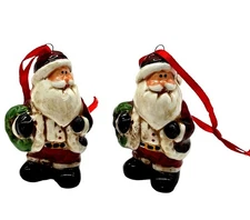Set of 2 Ceramic Santa Holding Wreath by Transpac Red Santa Suite Black Boots