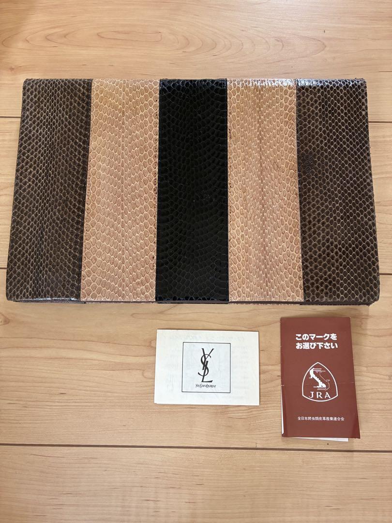 Pochette Yves Saint Laurent in pelle marrone nero beige lusso classica elegante