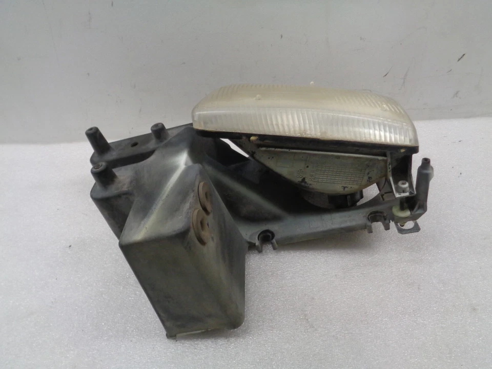 Lámpara de faro izquierdo para conductor Dodge Ram 1500 Van 98-03 con soporte OEM AK2411242 Foto 3 de 4