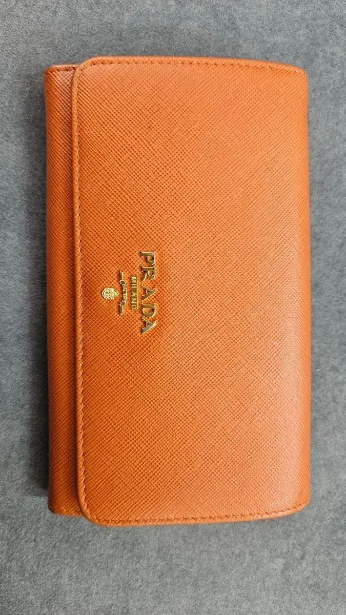 PRADA Saffiano Leather Bifold Wallet Orange Gold Logo Lettering Compact Purse