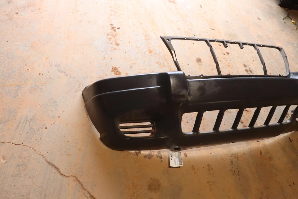 Jeep Grand Cherokee 1999-2004 parachoques delantero carcasa de plástico cubierta panel OEM Foto 3 de 4