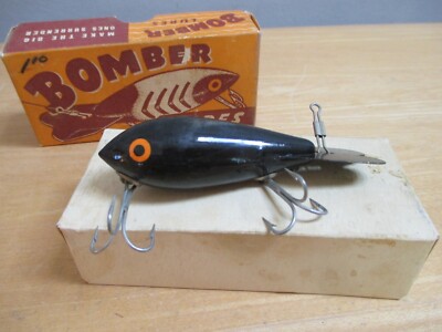 bottle of alcohol with fish lure CRB Glass Burner Pump Vibe Real food taste and ALTI Elite Baitcaster: The Model:7825-NI-3/0-100 / Hook Size: 3/0 / Pack Qty: 100