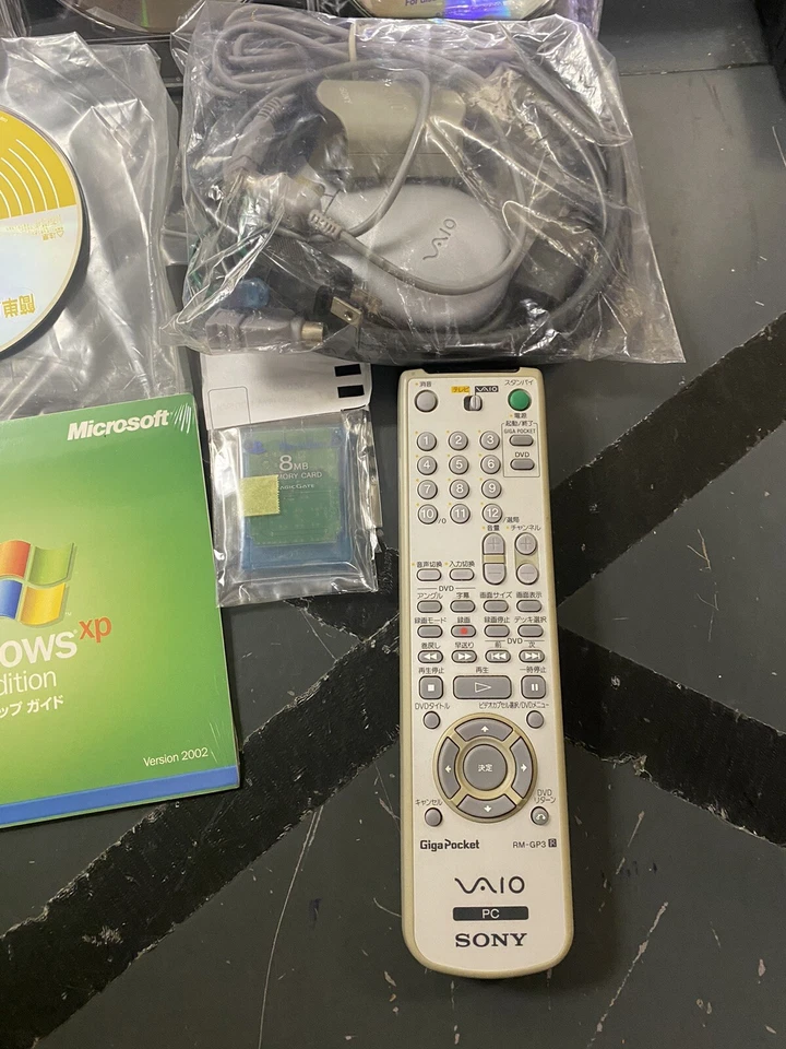 Paquete Sony Vaio vintage (ratón, disco, folletos, control remoto) Foto 3 de 4