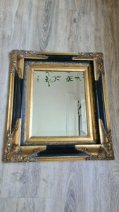 Miroir biseauté noir et doré sculpté / Vintage