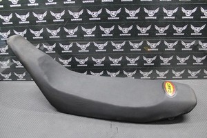 1999 SUZUKI RM250 OEM SEAT SADDLE FOAM PAN SHAVED LOW  W/ CEET GRIPPER COVER 
