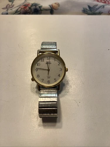 Vintage Timex Watch Gold Tone Indiglo Stretch Band