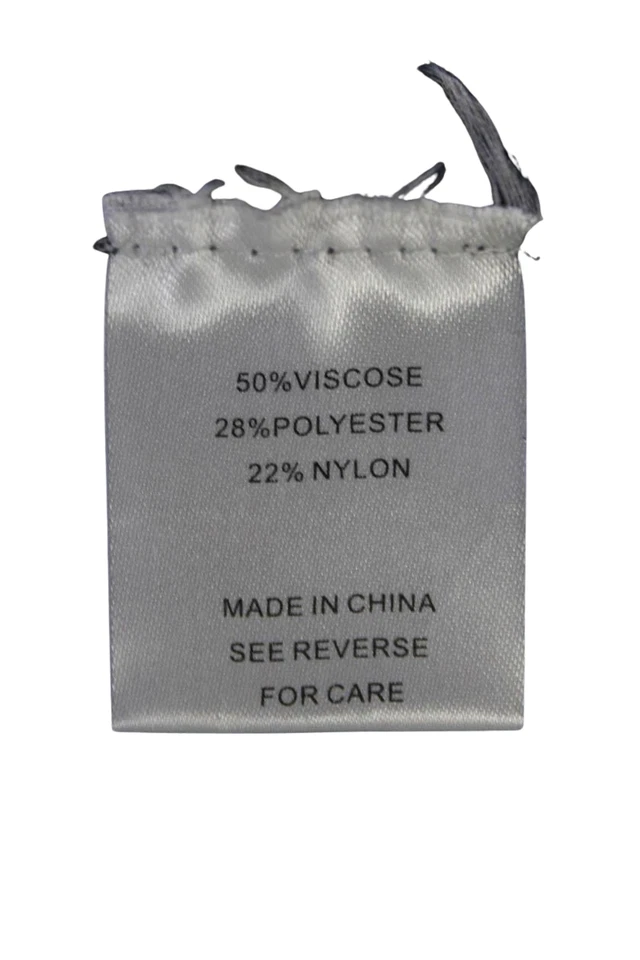 Falda acampanada midi tejida con flecos cintura elástica de primera fila gris talla pequeña Foto 4 de 4