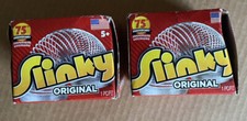 Pair of 75th Anniversary New in Box Slinky  s Never Opened