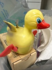 Vintage wind up duck made in Hong Kong. Missing feather