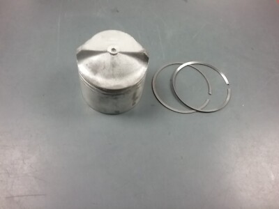 Piston with rings for a Johnson or Evinrude outboard motor 396587 .030