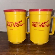 (2) Vintage Carnation Instant Breakfast Yellow Plastic Mugs w/ Red Lids Rare