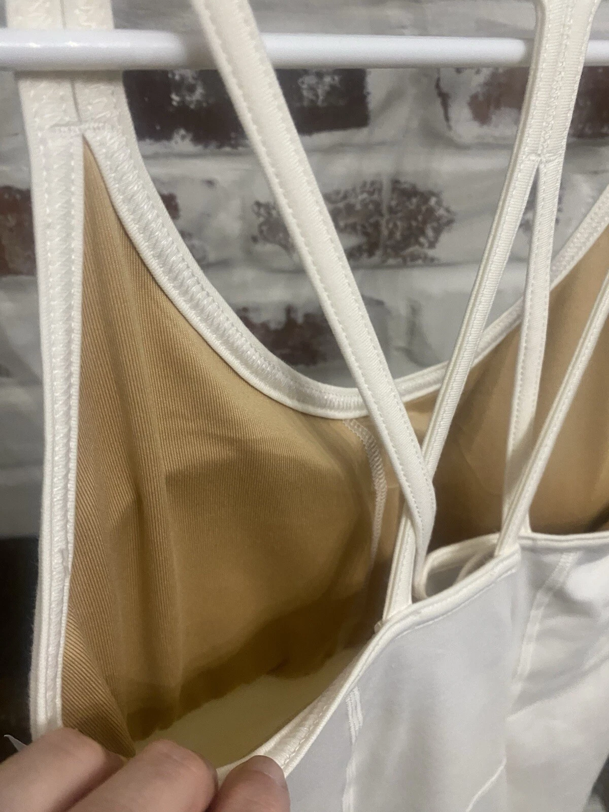 OFF WHITE Reggiseno vestito Oldy Navyvo att topto cortosto nasco tascae colore bianco sporc nuo conchetta eti sm.ghia