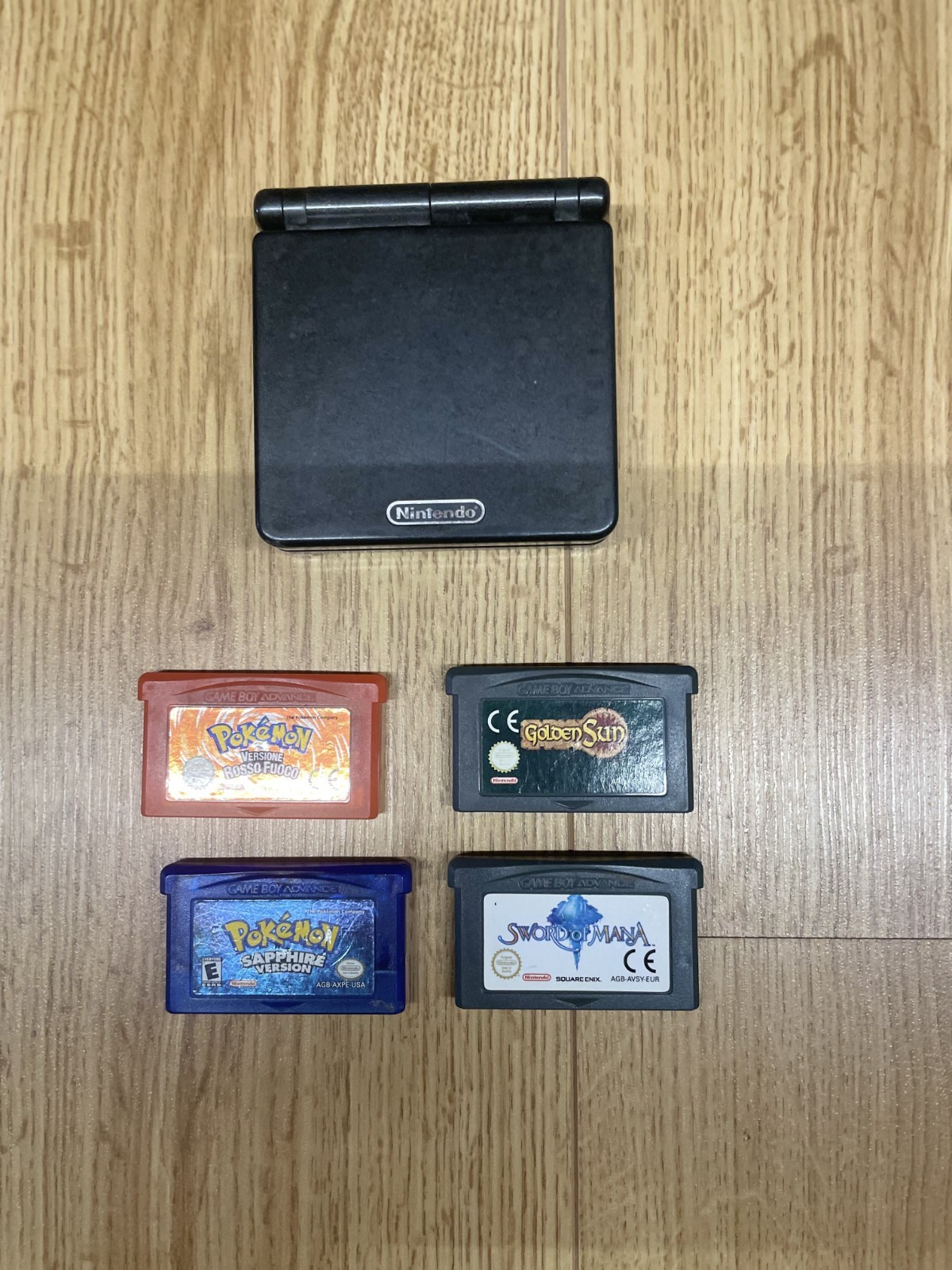 Game Boy Advance SP AGS-101 Retroilluminata + 4 Giochi Pokemon Rosso Fuoco Zaffi
