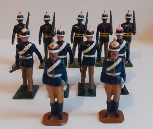 ELEVEN VINTAGE LEAD SOLDIERS - BLUE TUNIC/ PITH HELMETS WITH RED/BLUE BANDS - Afbeelding 1 van 10
