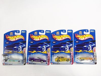 Lot of 4 Hot Wheels Mixed Assorted Carded Cars 2002 64 Lincoln