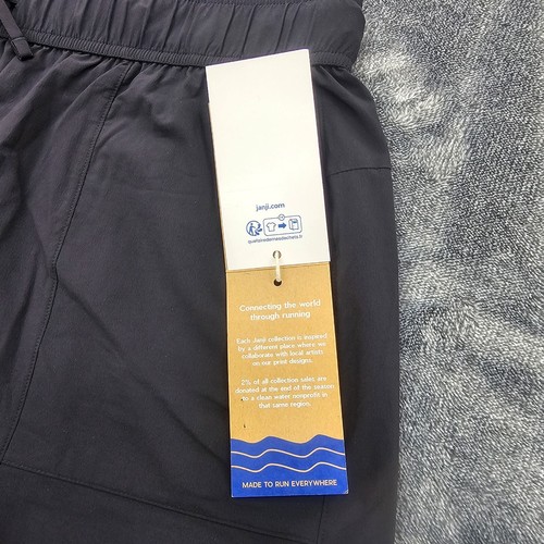 Janji Omni 4" Shorts Womens Large Midnight black trail UPF 50+ stretch NEW - Picture 6 of 11