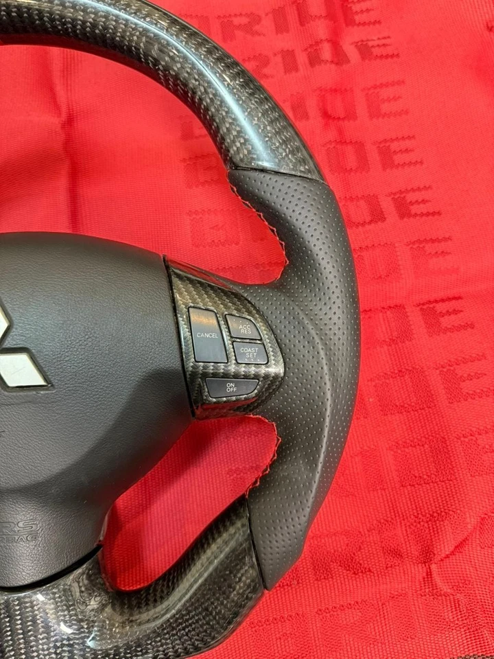 MITSUBISHI LANCER EVOLUTION 2007-2016 VOLANTE SUPERPUESTO FIBRA CARBONO REAL Foto 3 de 4