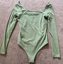 Women  s Size Medium Bodysuit