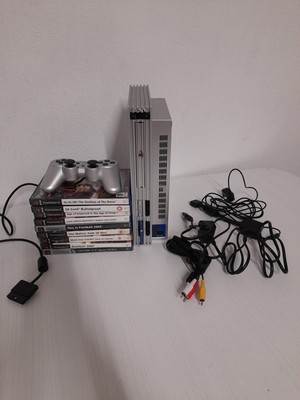 Sony PlayStation 2 Konsole PS2 mit Kabeln und Controller und Spielen