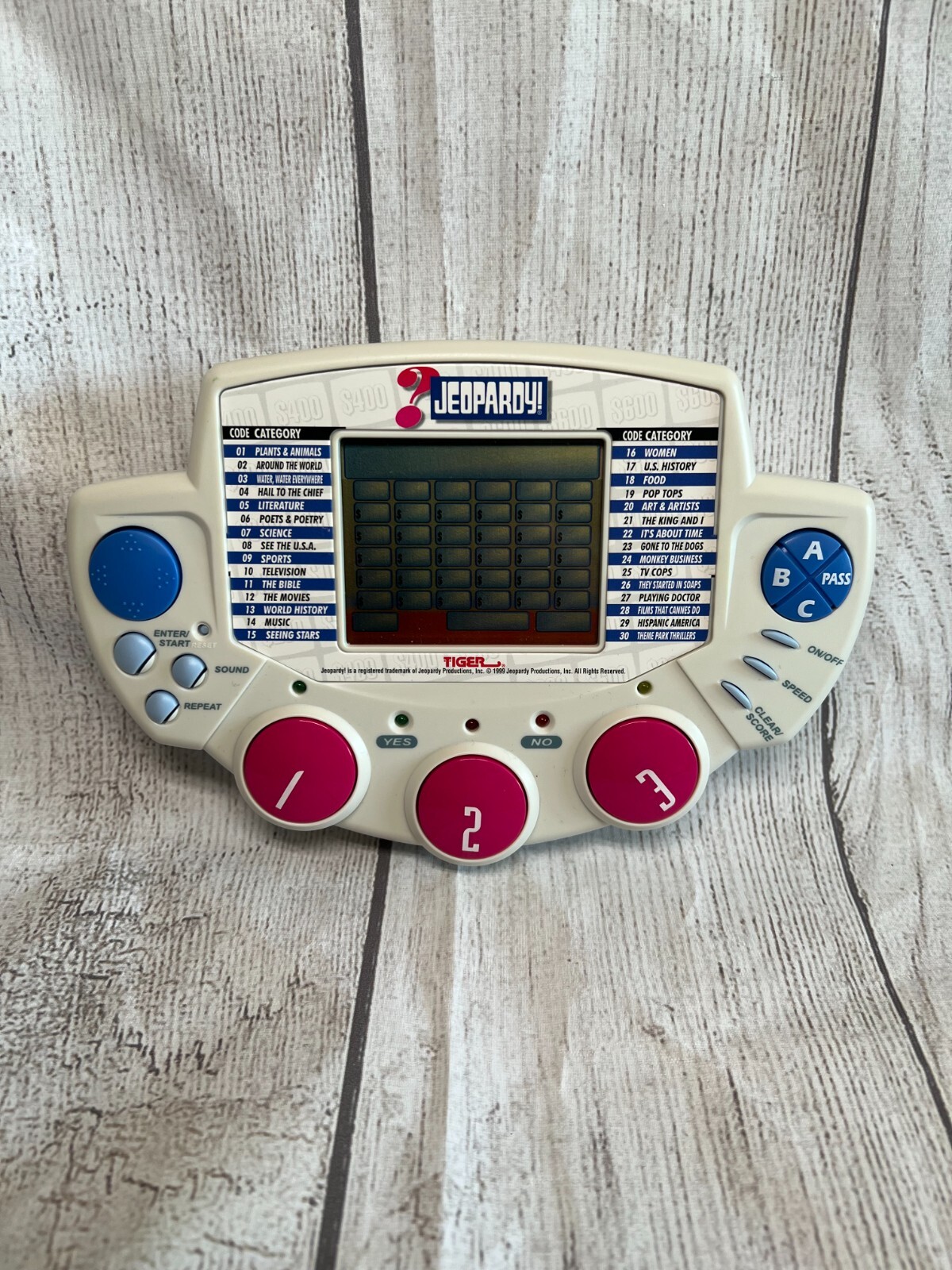 JEOPARDY HANDHELD ELECTRONIC GAME1999 VERSION WITH CARTRIDGEWORKS