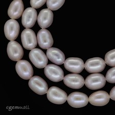 15.8" Pink Freshwater Pearl Rice Oval Beads 6x7.5-8mm 66247