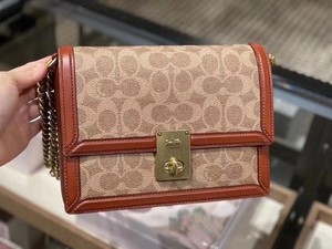 coach hutton snakeskin bolsa