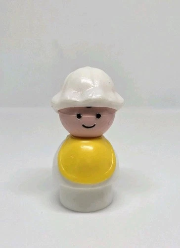 Vintage Fisher Price little people white baby 👶 with yellow bib & bonnet