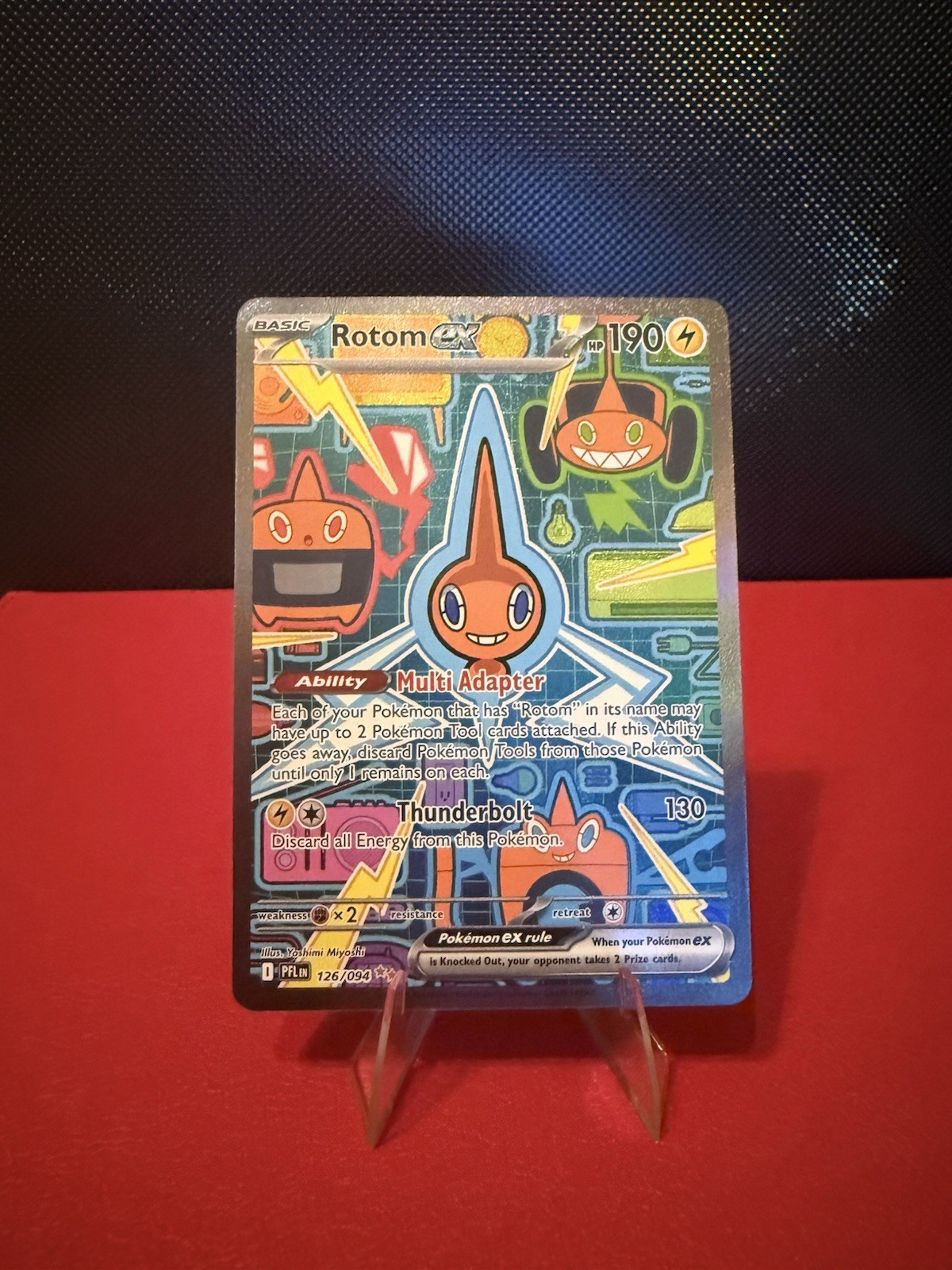 Rotom EX 126/094 Me02: Phantasmal Flames Holo