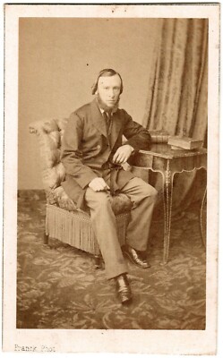 Cdv.A man with a beard sitting on an armchair.Table.Albumen Photo Franck.Paris.