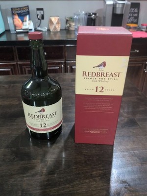 Empty Bottle And Box Of Redbreast Single Pot Still Irish 12 Years Aged Whiskey