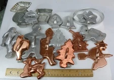 Lot of 23 vintage metal cookie cutters and molds