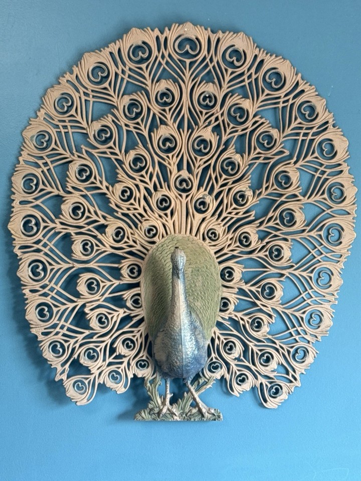 A massive 34"x30" Burwood USA peacock wall sculpture from the 1960s — the kind of statement piece that makes an entire room's personality.