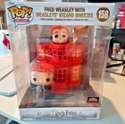 Funko Pop! Deluxe: Harry Potter-Fred Weasley with Weasleys' Wizard Wheezes #158