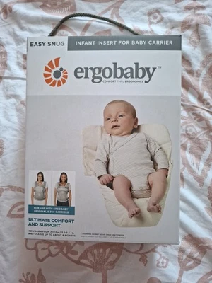 Ergobaby Sitzverkleiner Beige mit Orginalverpackung / Bedienungsanleitung - Bild 1 von 4