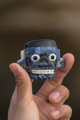 Handcrafted lapis lazuli  Head  Black obsidian with Inlaid bone  Eyes & Teeth 